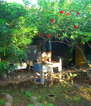 8-Washing clothes in the pila at Casa Baltimore