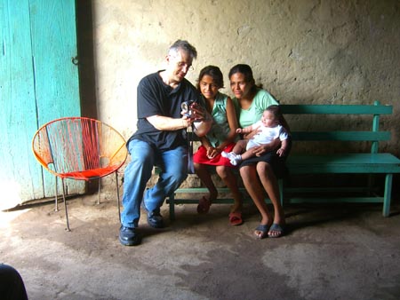 9-Ken showing photos to the girls at Nidia's